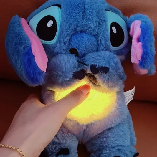 Peluche Stitch musicale avec respiration, lumières et musique. Jouet apaisant Disney pour bébé et enfant, idéale pour le sommeil et les cadeaux.